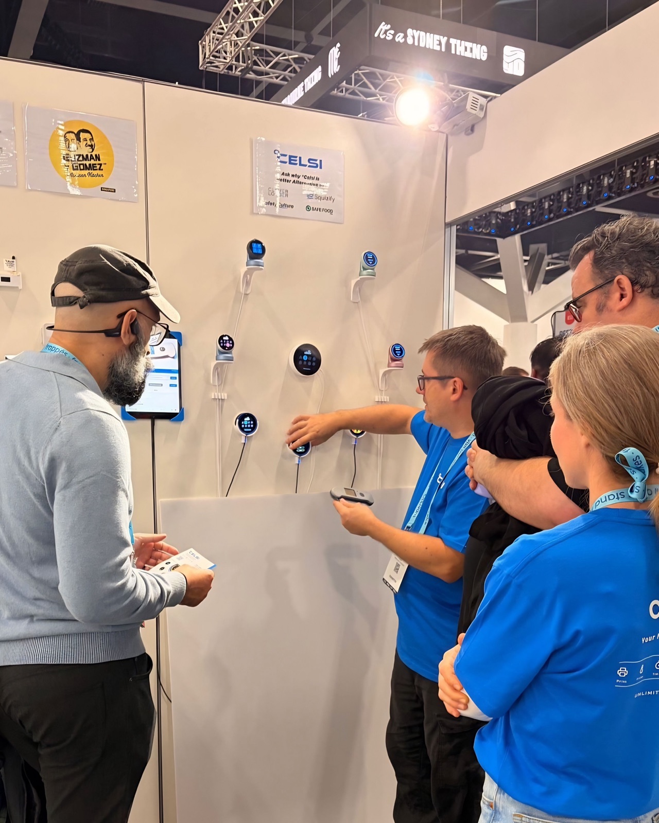 Operators getting hands-on with AIKA, the °Celsi AI kitchen assistant, on the sensor wall