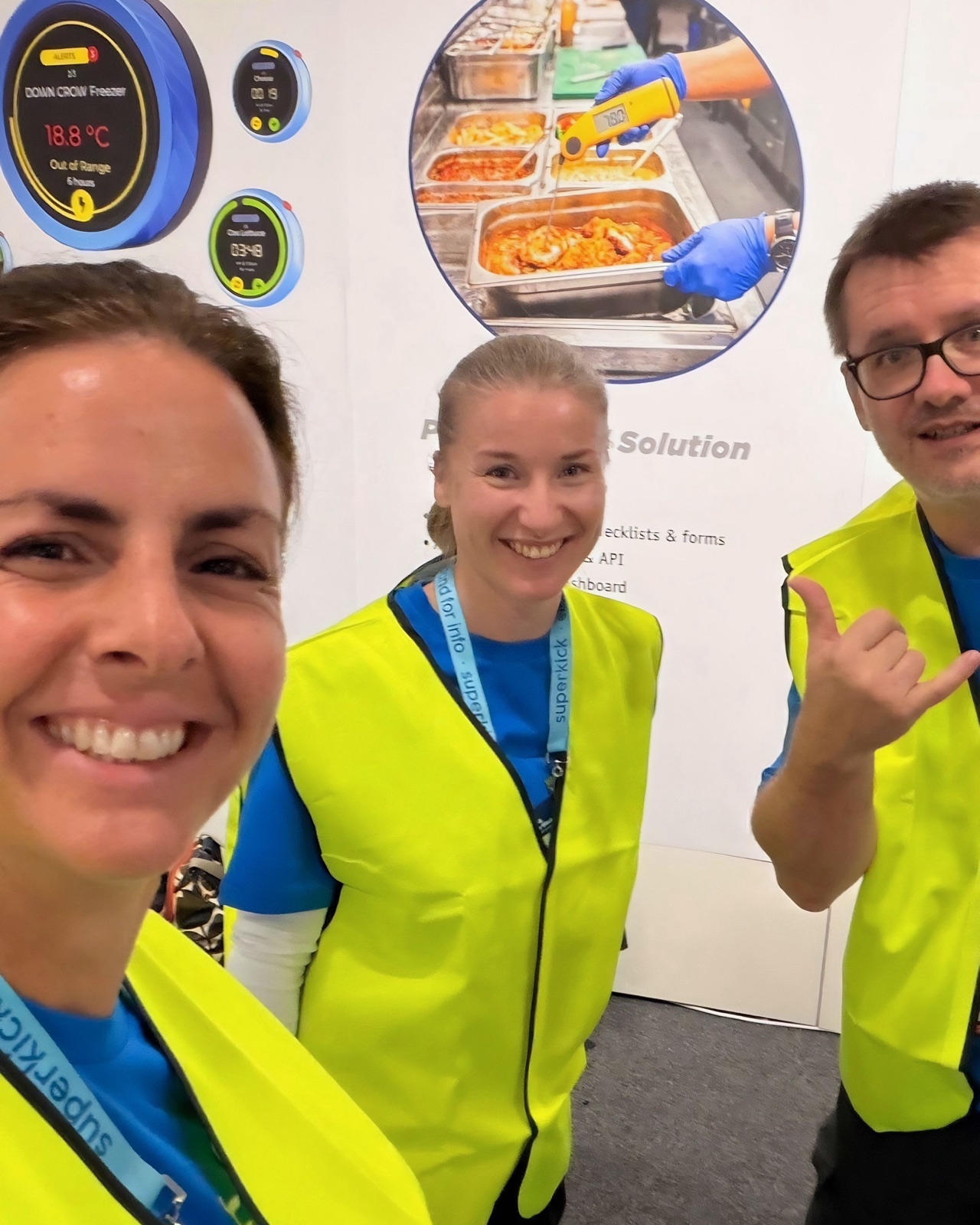 The °Celsi team in hi-vis vests, smiling mid-show